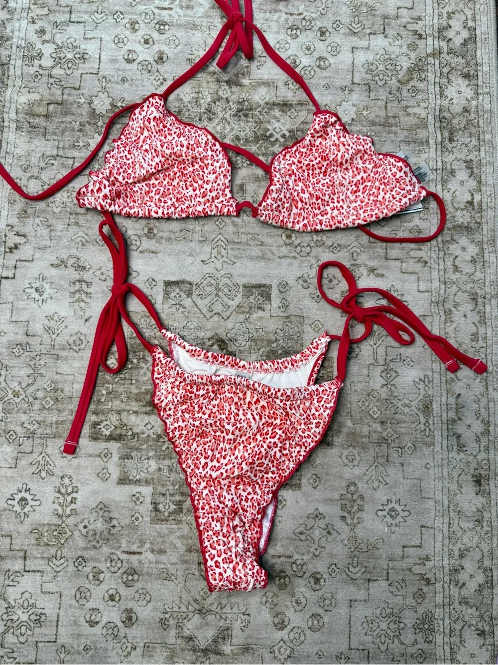 Frankies Bikinis Reign Triangle Bikini Set features a bold red leopard print